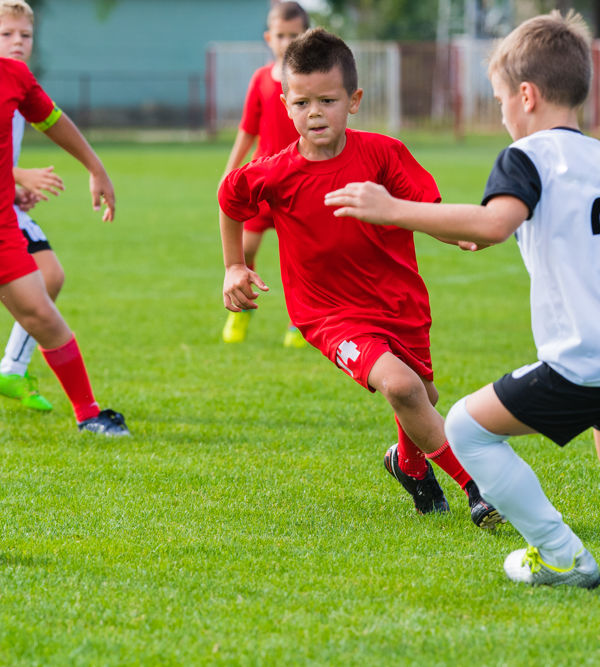 Voetbal kinderen Kinderen spelen voetbal